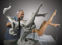 Leon Richman sculpting with live model